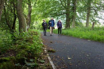 Jane Courtney, Auchterarder Core Paths Working Group, along with Stuart, former Chair of Auchterarder Community Sports Association) and Alison Bonney walk along the upgraded Provost Walk ©PKCT