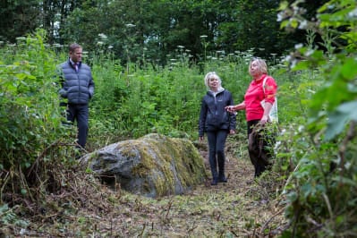 Julia Howe and Jane Courtney, Auchterarder Core Paths Working Group, and Brian Cargill, PKC Traffic Services, at the Granny Stane just off the Provost Walk ©PKCT